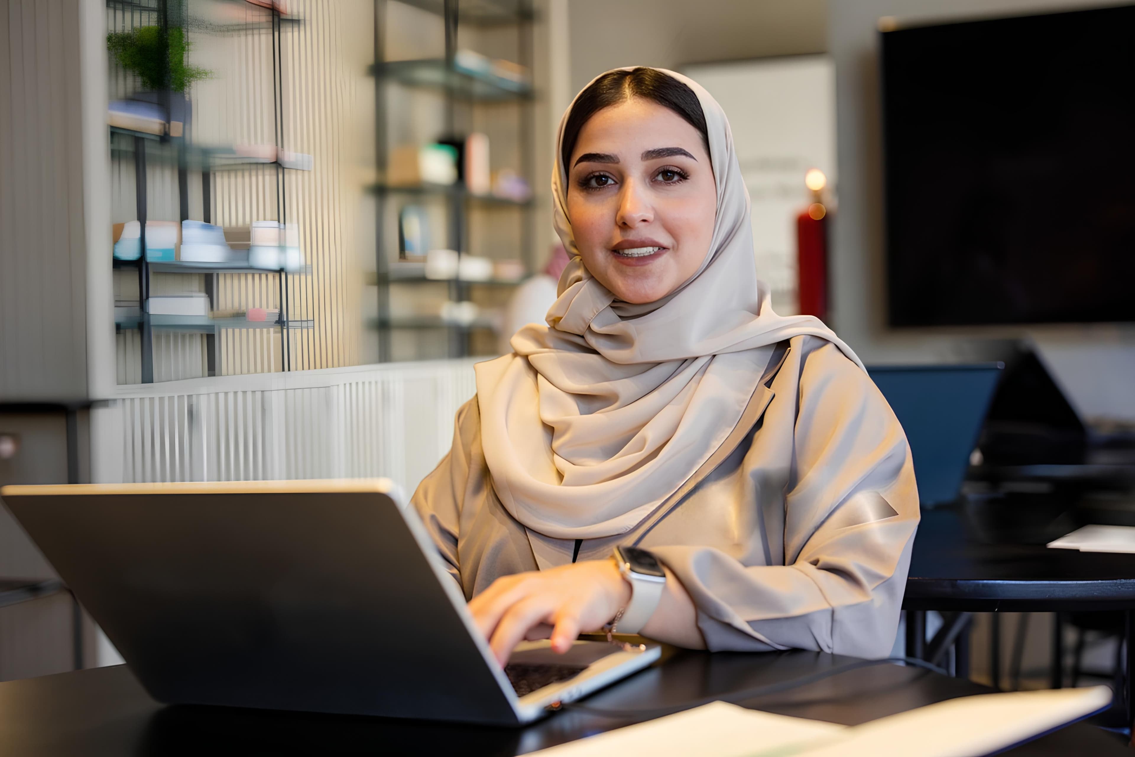 Talented professional working on laptop